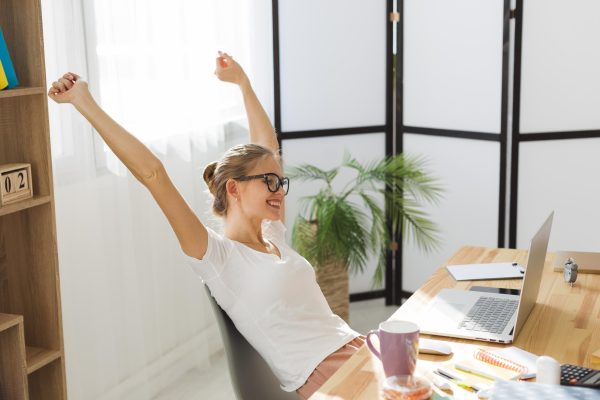 side-view-happy-woman-working-home